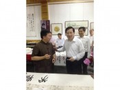 采访省委书记強卫到书